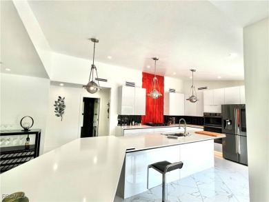 Modern Elegance Meets Florida Living in Imperial Golf Estates! on Imperial Golf Club in Florida - for sale on GolfHomes.com, golf home, golf lot