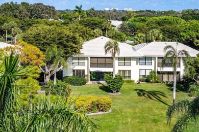 Enjoy picturesque views of the lush golf course and serene on Quail Ridge Golf Course and Country Club in Florida - for sale on GolfHomes.com, golf home, golf lot