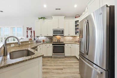 Raised beach home located in the gated community of The Cottages on Surf Golf and Beach Club in South Carolina - for sale on GolfHomes.com, golf home, golf lot