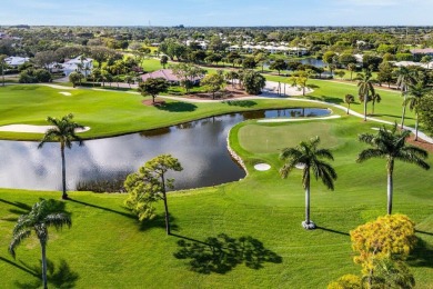 Enjoy picturesque views of the lush golf course and serene on Quail Ridge Golf Course and Country Club in Florida - for sale on GolfHomes.com, golf home, golf lot