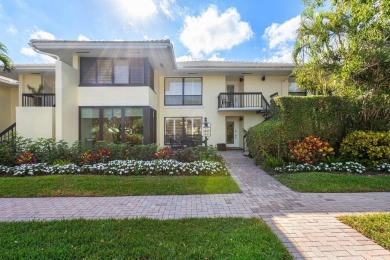 Enjoy picturesque views of the lush golf course and serene on Quail Ridge Golf Course and Country Club in Florida - for sale on GolfHomes.com, golf home, golf lot