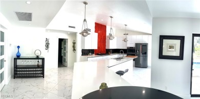 Modern Elegance Meets Florida Living in Imperial Golf Estates! on Imperial Golf Club in Florida - for sale on GolfHomes.com, golf home, golf lot