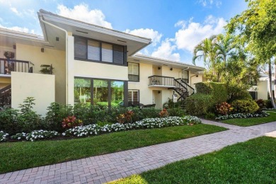 Enjoy picturesque views of the lush golf course and serene on Quail Ridge Golf Course and Country Club in Florida - for sale on GolfHomes.com, golf home, golf lot