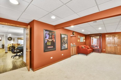 Prepare to be captivated by this remarkable brick Colonial home on Hawthorn Woods Country Club in Illinois - for sale on GolfHomes.com, golf home, golf lot