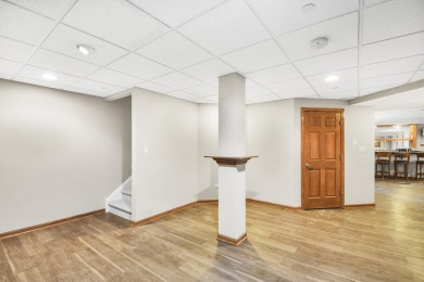 Prepare to be captivated by this remarkable brick Colonial home on Hawthorn Woods Country Club in Illinois - for sale on GolfHomes.com, golf home, golf lot