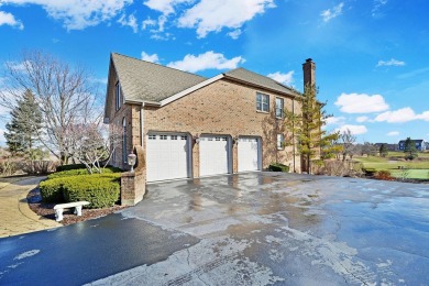 Prepare to be captivated by this remarkable brick Colonial home on Hawthorn Woods Country Club in Illinois - for sale on GolfHomes.com, golf home, golf lot