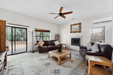 Beautiful home in gated community! This charming home is in the on Santa Fe Country Club in New Mexico - for sale on GolfHomes.com, golf home, golf lot