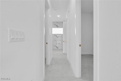 This newly built home in Port Charlotte, FL, is a luxury gem on Rotonda Golf and Country Club - Long Marsh  in Florida - for sale on GolfHomes.com, golf home, golf lot