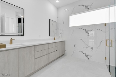 This newly built home in Port Charlotte, FL, is a luxury gem on Rotonda Golf and Country Club - Long Marsh  in Florida - for sale on GolfHomes.com, golf home, golf lot