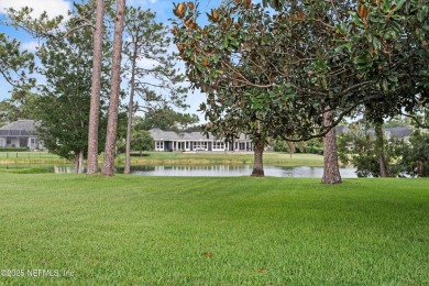 Timeless and inviting, this all-brick, one-level home is nestled on The Deerwood Country Club in Florida - for sale on GolfHomes.com, golf home, golf lot