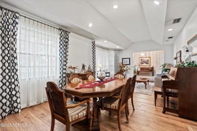 Timeless and inviting, this all-brick, one-level home is nestled on The Deerwood Country Club in Florida - for sale on GolfHomes.com, golf home, golf lot