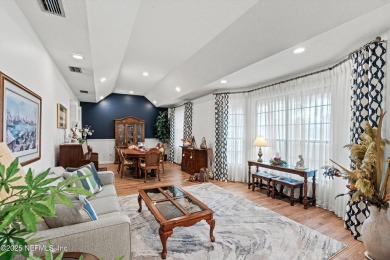 Timeless and inviting, this all-brick, one-level home is nestled on The Deerwood Country Club in Florida - for sale on GolfHomes.com, golf home, golf lot