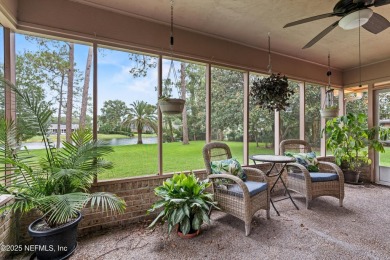 Timeless and inviting, this all-brick, one-level home is nestled on The Deerwood Country Club in Florida - for sale on GolfHomes.com, golf home, golf lot