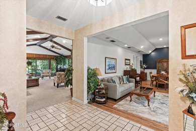 Timeless and inviting, this all-brick, one-level home is nestled on The Deerwood Country Club in Florida - for sale on GolfHomes.com, golf home, golf lot