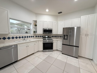Priced to Sell! This charming 3-bedroom, 2-bathroom home on PGA National Golf Club in Florida - for sale on GolfHomes.com, golf home, golf lot