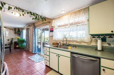 Lovely corner lot Pueblo-style home with large front and back on Pueblo de Cochiti Golf Course in New Mexico - for sale on GolfHomes.com, golf home, golf lot