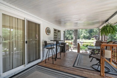 The Ultimate Waterfront Getaway awaits you at in a gated lake on River Golf and County Club at Lake Royale in North Carolina - for sale on GolfHomes.com, golf home, golf lot