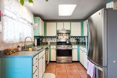 Lovely corner lot Pueblo-style home with large front and back on Pueblo de Cochiti Golf Course in New Mexico - for sale on GolfHomes.com, golf home, golf lot