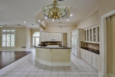 Presenting an exceptional custom home situated on two riverfront on Pecan Plantation Country Club in Texas - for sale on GolfHomes.com, golf home, golf lot