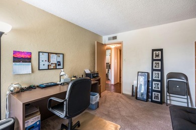 Lovely corner lot Pueblo-style home with large front and back on Pueblo de Cochiti Golf Course in New Mexico - for sale on GolfHomes.com, golf home, golf lot