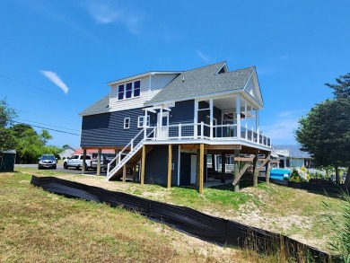 This Gorgeous waterfront home in Captains Cove is nearing on Captains Cove Golf and Yacht Club in Virginia - for sale on GolfHomes.com, golf home, golf lot