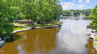 The Ultimate Waterfront Getaway awaits you at in a gated lake on River Golf and County Club at Lake Royale in North Carolina - for sale on GolfHomes.com, golf home, golf lot
