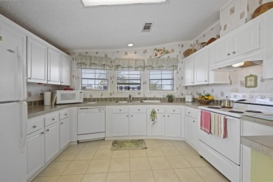 Move in ready and just waiting for your own personal touch. This on Maple Leaf Golf and Country Club in Florida - for sale on GolfHomes.com, golf home, golf lot
