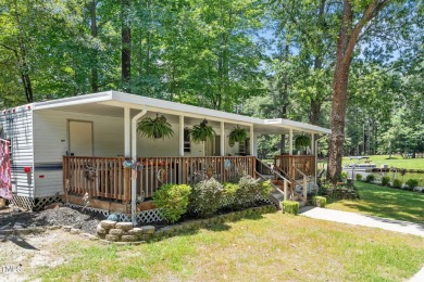 The Ultimate Waterfront Getaway awaits you at in a gated lake on River Golf and County Club at Lake Royale in North Carolina - for sale on GolfHomes.com, golf home, golf lot