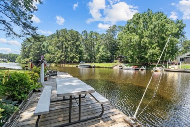 The Ultimate Waterfront Getaway awaits you at in a gated lake on River Golf and County Club at Lake Royale in North Carolina - for sale on GolfHomes.com, golf home, golf lot