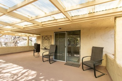 This popular adobe style townhome in Riverhill feels like an on Riverhill Country Club in Texas - for sale on GolfHomes.com, golf home, golf lot