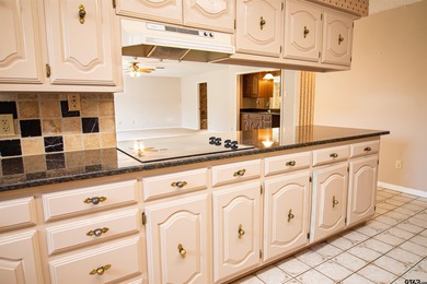 Lakefront classic! Brick ranch style home is ready for on Holly Lake Ranch Golf Club in Texas - for sale on GolfHomes.com, golf home, golf lot