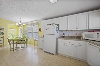 Move in ready and just waiting for your own personal touch. This on Maple Leaf Golf and Country Club in Florida - for sale on GolfHomes.com, golf home, golf lot