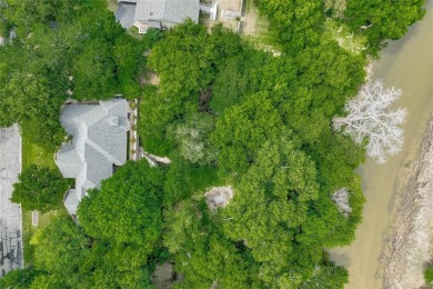 Presenting an exceptional custom home situated on two riverfront on Pecan Plantation Country Club in Texas - for sale on GolfHomes.com, golf home, golf lot