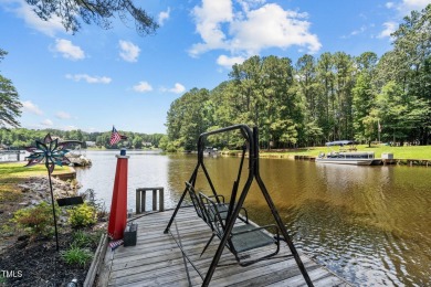The Ultimate Waterfront Getaway awaits you at in a gated lake on River Golf and County Club at Lake Royale in North Carolina - for sale on GolfHomes.com, golf home, golf lot