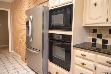 Lakefront classic! Brick ranch style home is ready for on Holly Lake Ranch Golf Club in Texas - for sale on GolfHomes.com, golf home, golf lot