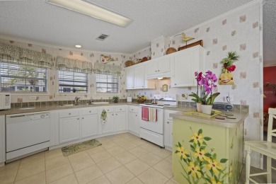 Move in ready and just waiting for your own personal touch. This on Maple Leaf Golf and Country Club in Florida - for sale on GolfHomes.com, golf home, golf lot
