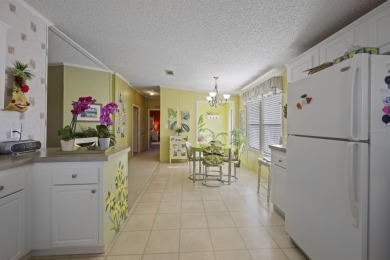 Move in ready and just waiting for your own personal touch. This on Maple Leaf Golf and Country Club in Florida - for sale on GolfHomes.com, golf home, golf lot