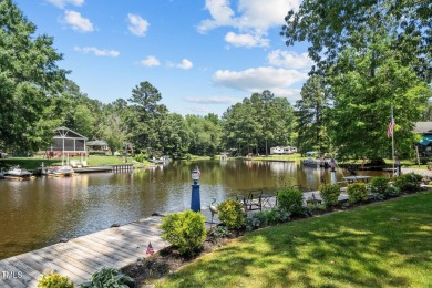 The Ultimate Waterfront Getaway awaits you at in a gated lake on River Golf and County Club at Lake Royale in North Carolina - for sale on GolfHomes.com, golf home, golf lot