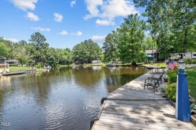 The Ultimate Waterfront Getaway awaits you at in a gated lake on River Golf and County Club at Lake Royale in North Carolina - for sale on GolfHomes.com, golf home, golf lot