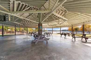 The Ultimate Waterfront Getaway awaits you at in a gated lake on River Golf and County Club at Lake Royale in North Carolina - for sale on GolfHomes.com, golf home, golf lot
