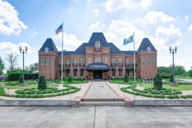 Prime location on the 1st fairway with spectacular views of golf on LeTriomphe Golf and Country Club in Louisiana - for sale on GolfHomes.com, golf home, golf lot