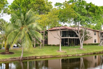 Gorgeous and fully updated WATERFRONT, lake view, corner unit in on Boca Lago Golf and Country Club in Florida - for sale on GolfHomes.com, golf home, golf lot