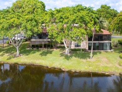 Gorgeous and fully updated WATERFRONT, lake view, corner unit in on Boca Lago Golf and Country Club in Florida - for sale on GolfHomes.com, golf home, golf lot
