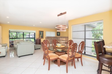 Gorgeous and fully updated WATERFRONT, lake view, corner unit in on Boca Lago Golf and Country Club in Florida - for sale on GolfHomes.com, golf home, golf lot