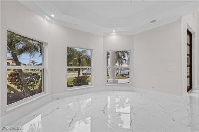 ELEVATION, LOCATION, BEAUTY! This GULF ACCESS 4 bed/5 bath 3,208 on Palmetto-Pine Country Club in Florida - for sale on GolfHomes.com, golf home, golf lot