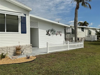 This charming two-bedroom, two-bath home offers an exceptional on Lily Lake Golf and RV Resort in Florida - for sale on GolfHomes.com, golf home, golf lot