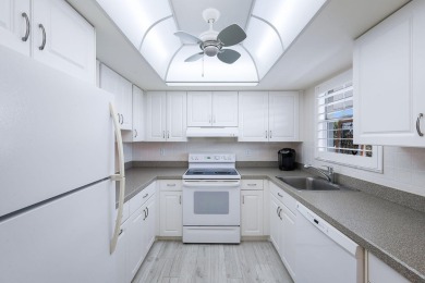 Looking for a lovely, updated condominium with a Structure on Hibiscus Golf Club in Florida - for sale on GolfHomes.com, golf home, golf lot