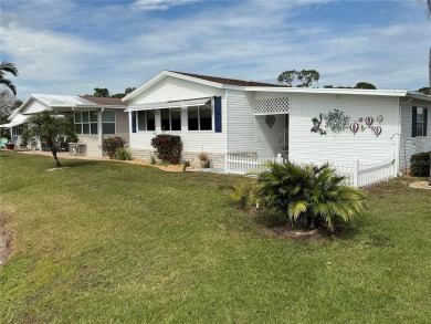 This charming two-bedroom, two-bath home offers an exceptional on Lily Lake Golf and RV Resort in Florida - for sale on GolfHomes.com, golf home, golf lot