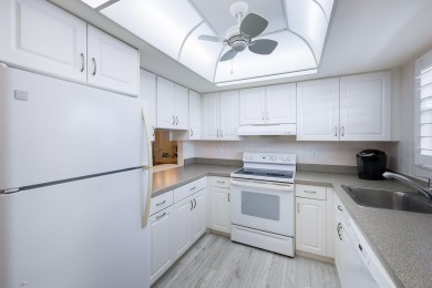 Looking for a lovely, updated condominium with a Structure on Hibiscus Golf Club in Florida - for sale on GolfHomes.com, golf home, golf lot