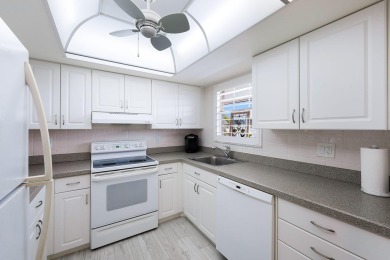 Looking for a lovely, updated condominium with a Structure on Hibiscus Golf Club in Florida - for sale on GolfHomes.com, golf home, golf lot